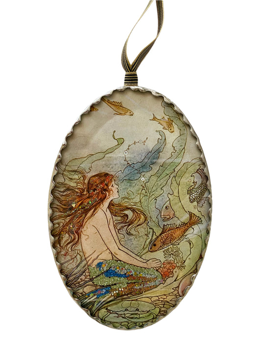 Decorative ornament with mermaid and fish design with silver soldered frame